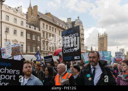 London, UK. 26th April 2016. Protesters march to the Department of Health to support the junior doctors' strike against the government's imposition of a new contract. Wiktor Szymanowicz/Alamy Live News Stock Photo