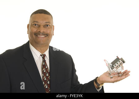 Smiling real estate agent Stock Photo