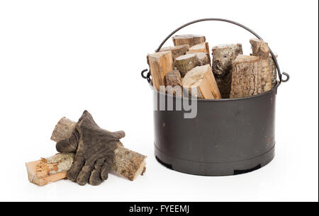 Metal basket of firewood, isolated on white Stock Photo