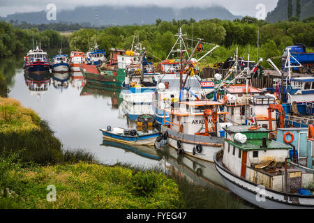 Fishing boats on the Aysen River at Puerto Aysen near Castro, Chile ...