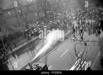 The police uses water guns against demonstrators, who demand Fritz Teufel's release on 27 November 1967. Stock Photo