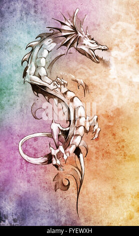 Sketch of tattoo art, big medieval dragon, fantasy concept over colorful paper Stock Photo