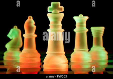 red and green glass chess pieces Stock Photo