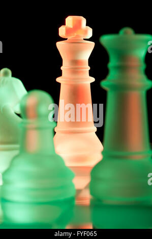 red and green glass chess pieces Stock Photo