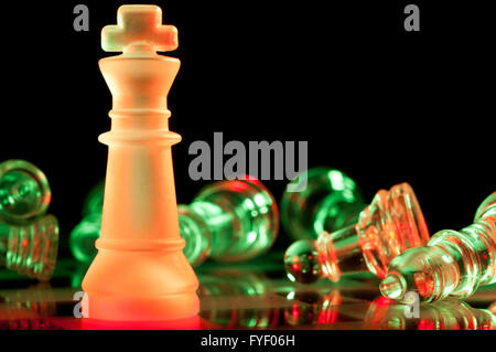 red and green glass chess pieces Stock Photo