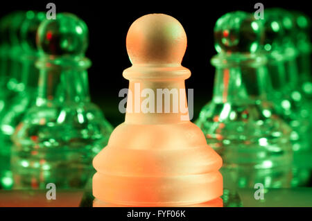 red and green glass chess pieces Stock Photo