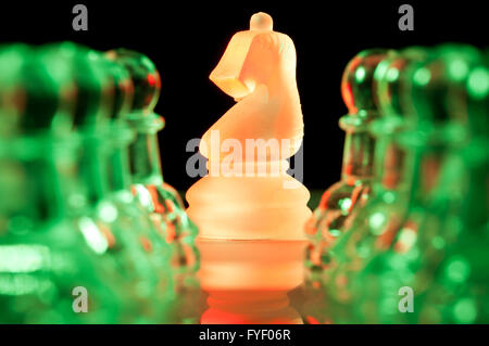 red and green glass chess pieces Stock Photo