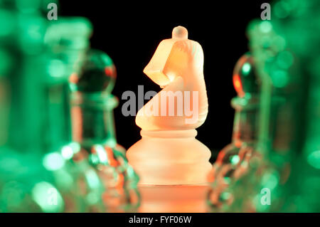 red and green glass chess pieces Stock Photo