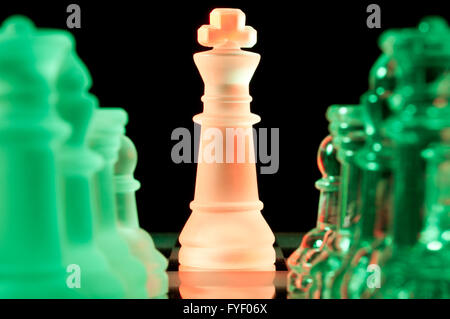 red and green glass chess pieces Stock Photo