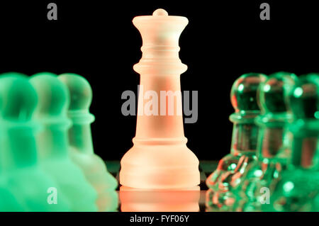 red and green glass chess pieces Stock Photo