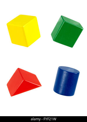 Wooden toy blocks isolated against a white background Stock Photo