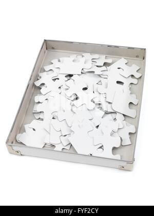 Jigsaw puzzle pieces isolated against a white background Stock Photo