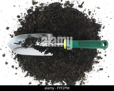 Garden soil and implements isolated against a white background Stock Photo