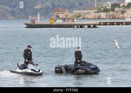 San Francisco Police Department Officers Afloat During The 2016 Polar Plunge, Alcatraz In The Background. Stock Photo