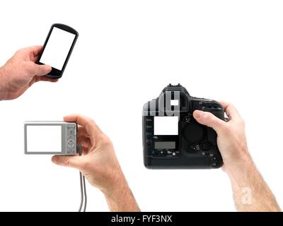 Digital cameras hand held isolated against a white background Stock Photo