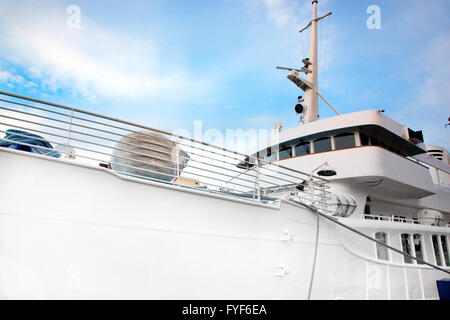 White tourist ship close up on blue sky Stock Photo