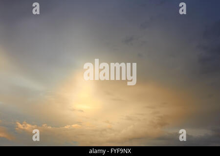 Sunlight breaks through the clouds Stock Photo