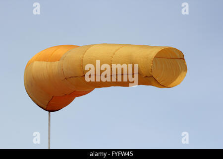 Wind direction Flag on blue cloud sky in  wind Stock Photo