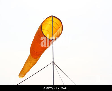 Wind direction Flag on blue cloud sky in  wind Stock Photo