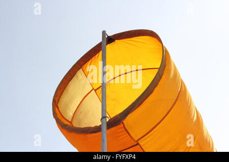 Wind direction Flag on blue cloud sky in  wind Stock Photo