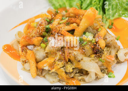 Fried Noodles with roasted chicken and mushroom Stock Photo