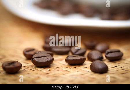 Roasted coffee bean on textured surface Stock Photo