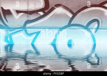 Graffiti reflection in the water, artistic chrome letters Stock Photo