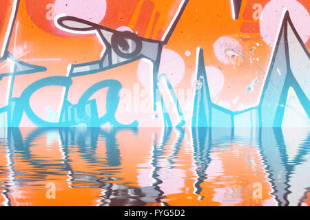 Abstract colorful graffiti reflection in the water Stock Photo