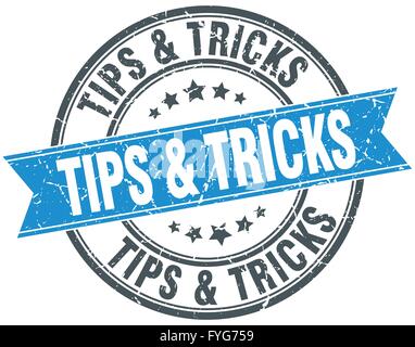 tips & tricks blue round grunge vintage ribbon stamp Stock Vector