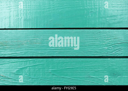 Fragment of wooden turquoise fence Stock Photo