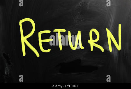 Return handwritten with white chalk on a blackboard Stock Photo