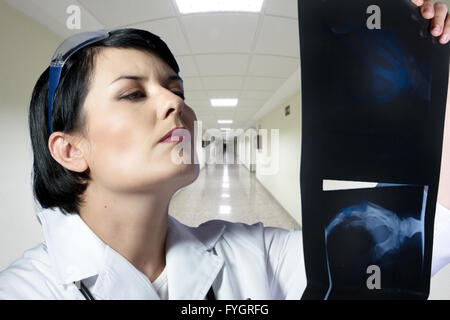 Female doctor looking at an x-ray Stock Photo