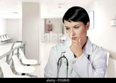 Portrait of a thoughtful middle aged nurse Stock Photo