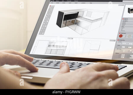 engineering concept: man using a laptop to design a car Stock Photo - Alamy