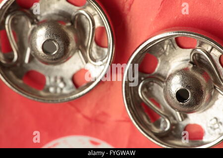 metal buttons photographed close Stock Photo