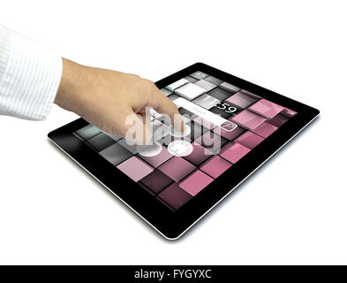 touchscreen tablet with colorful interface with color icons and buttons and a hand touching the screen isolated on white backgro Stock Photo