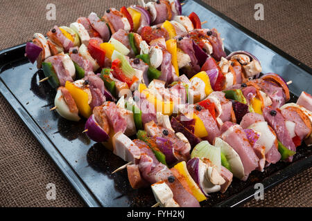 Raw pork skewers ready for grilling Stock Photo