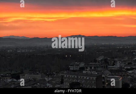 Fiery red sunset on the hills of Rimini Stock Photo