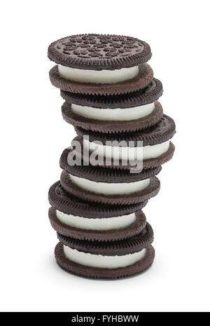 Stack of Chocolate Sandwich Cookies With Frosting Isolated on White Background. Stock Photo