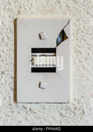 Broken light switch close up Stock Photo