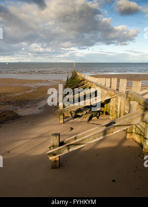 A traditional wooden groyne sea defence on Portobello Beach in Scotland. Stock Photo