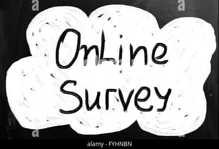 Online survey handwritten with chalk on a blackboard Stock Photo