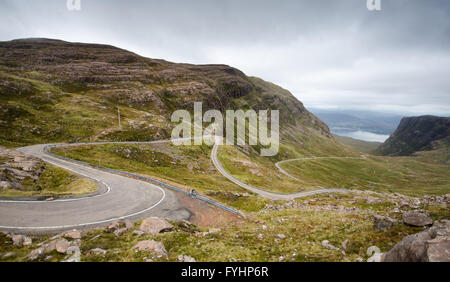 The twisting Bealach na Ba mountain pass, Britain's longest continuous ascent and third highest road, in the Scottish Highlands. Stock Photo