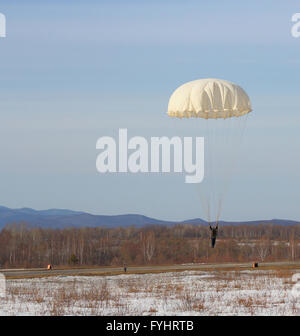 Parachutist Jumper in the helmet after the jump Stock Photo