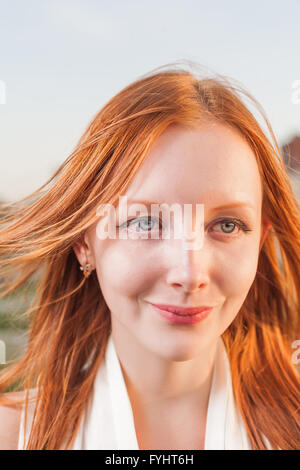 Head Shot Of A Smart Confident Smiling Millennial European Woman 