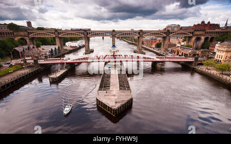 A Northern Rail Class 142 Pacer crosses the High Level Tyne Bridge from Gateshead approaching Newcastle. Stock Photo