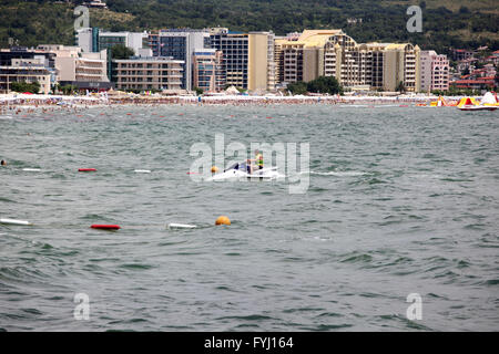SUNNY BEACH, BULGARIA - JUNE 19: People visit  Sunny Beach on June 19, 2014. Sunny Beach is the largest and most popular seaside Stock Photo