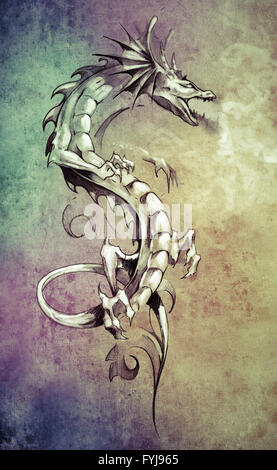 Sketch of tattoo art, big medieval dragon, fantasy concept over colorful paper Stock Photo