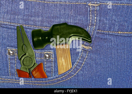 Work tools in Jeans Pocket Stock Photo
