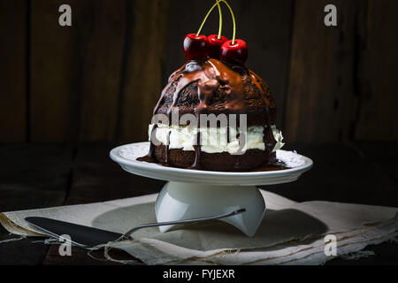 Delicious Chocolate Cake with Cherries on Top Stock Photo